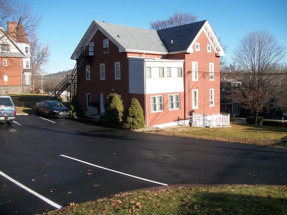 Back and side of apartment house.