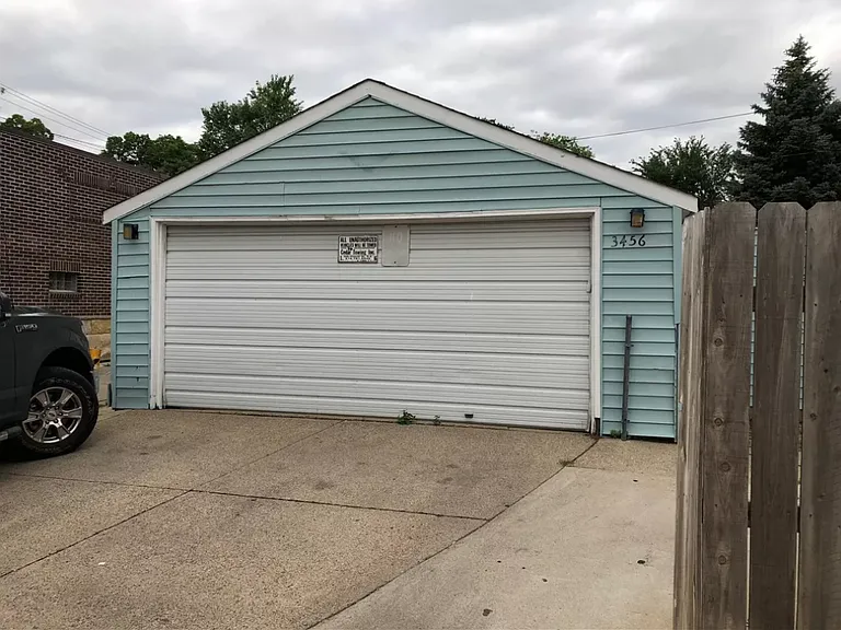 Garage (for unit 1) and parking slab entry