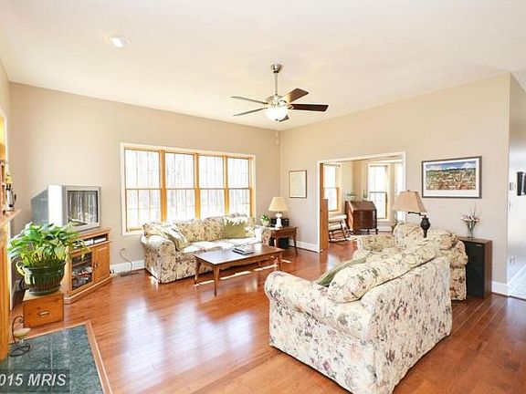 Family Room with Fireplace and Hardwood Floors