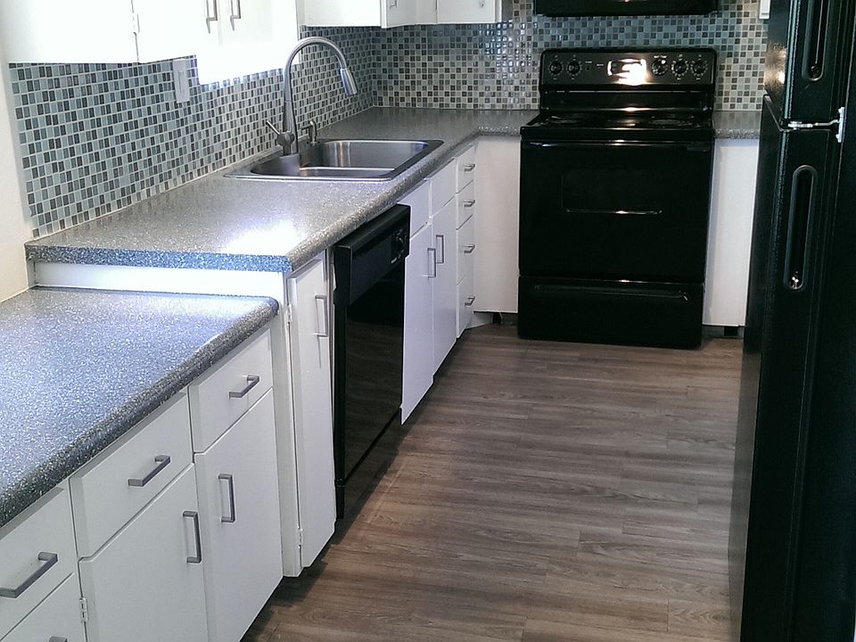Remodeled kitchen with new black appliances