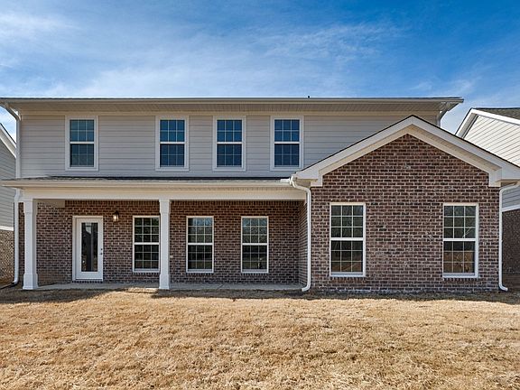 Large covered back porch is perfect for outdoor entertaining