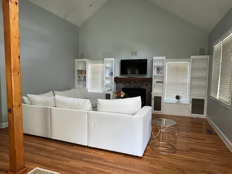 New mixed Oak flooring in Kitchen, Cedar Post Beam and Open format Living in The Nelson Wells House - Athens Georgia. Comfy downtown living near UGA, 2 hospitals, Med school, & Vet Medicine, University of Georgia