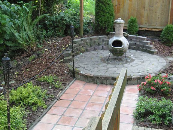 Fenced yard on the green belt with  patio and BBQ area.