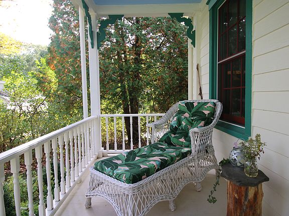 Porch overlooking the red barn