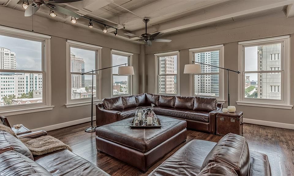 Absolutely spectacular Northeast corner unit at Keystone Lofts with 17 windows providing amazing skyline views and tons of natural light into the home. The last "A" unit at Keystone Lofts to come on market was over 6 years ago! ALL utilities included