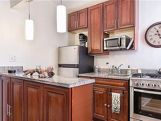3rd image of 160 E 3rd St APT 5H