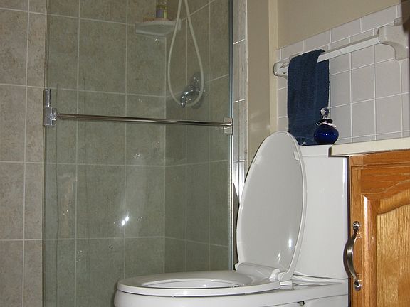 The master bathroom has a walk in shower.