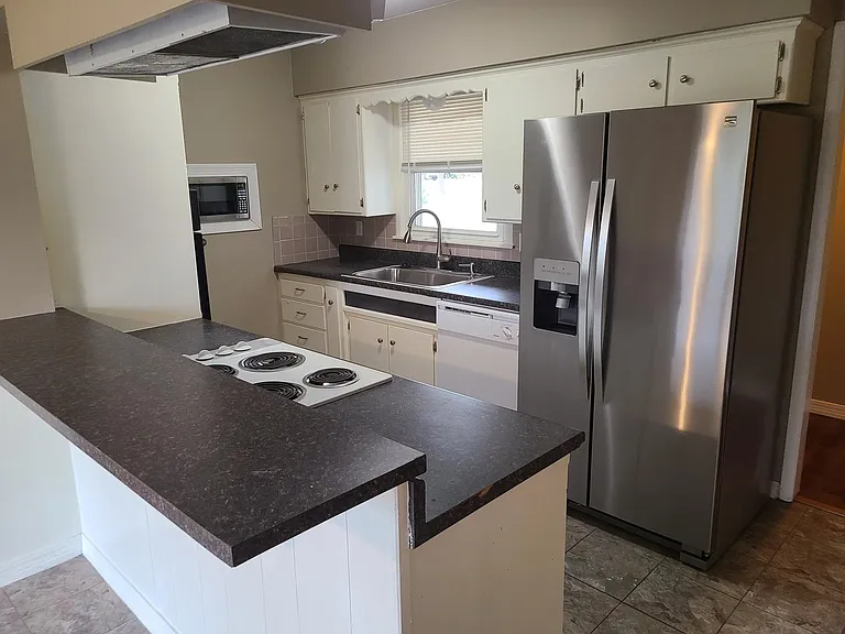 8033 E Dresden Ln — Photo 2