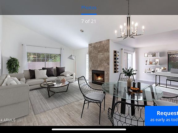 Open living room with vaulted ceilings and fireplace