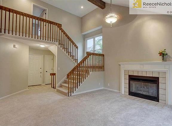 Vaulted ceilings create tons of volume in great room