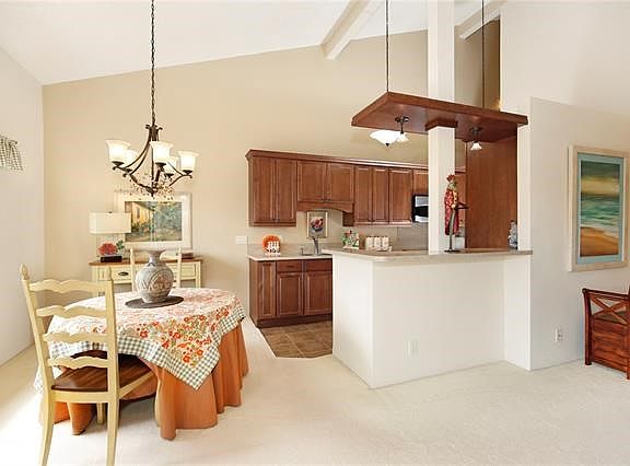 The kitchen is sure to be a favorite space.  Dining area can accommodate round or rectangular tables and has lovely views which can be filtered depending on the preference for amount of natural light.