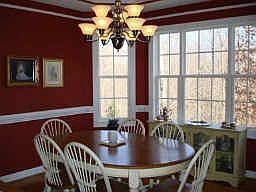 Formal dining room with trey-lit ceiling