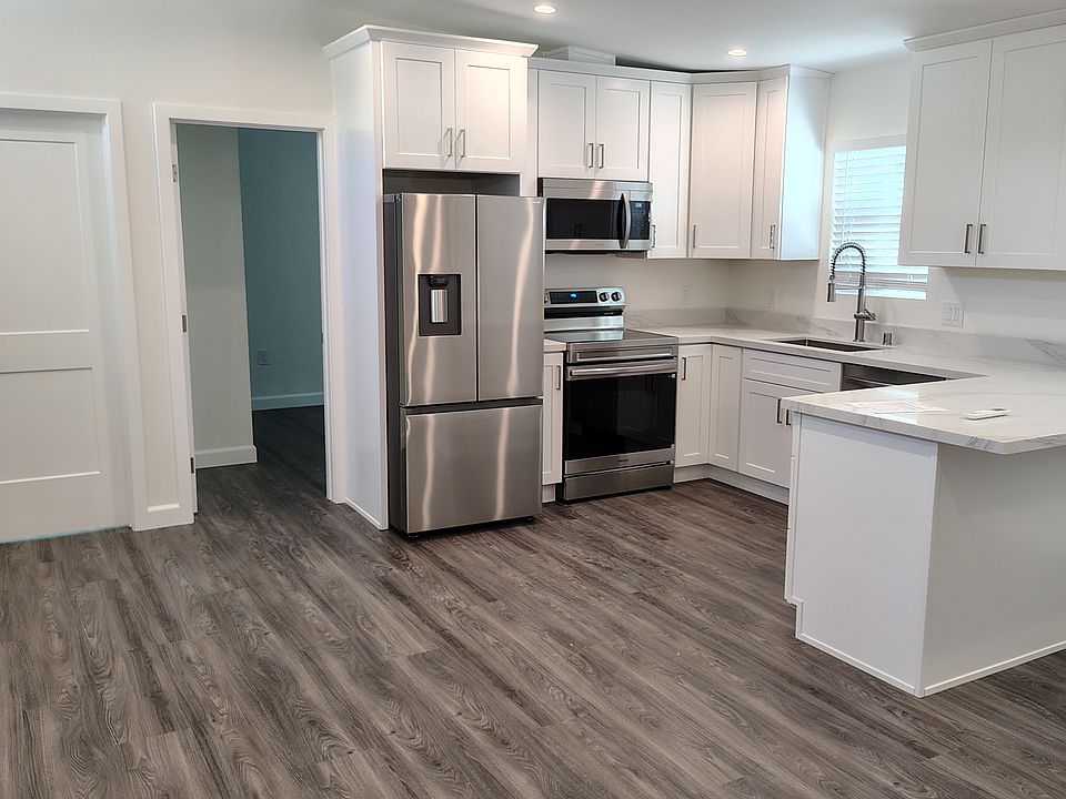 BRAND NEW FRIDGE IS INCLUDED