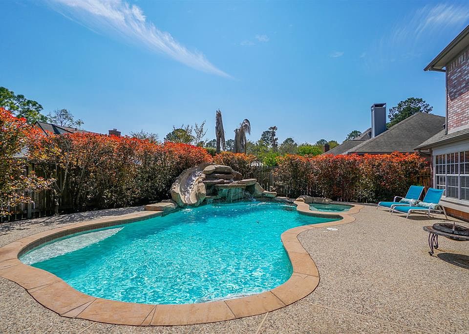 Cool off this summer in this beautiful pool with a water slide!