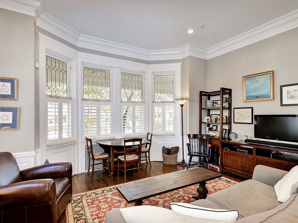 Living room with bay windows