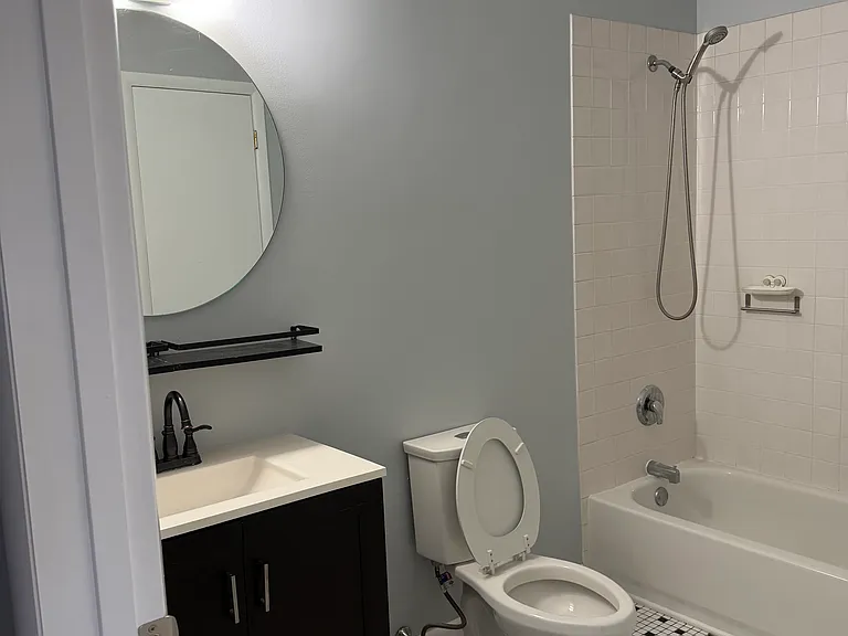 Spacious bathroom with plenty of storage.