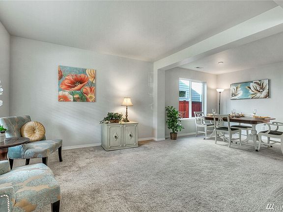 Formal living/sitting room is a great place to curl up with a book!