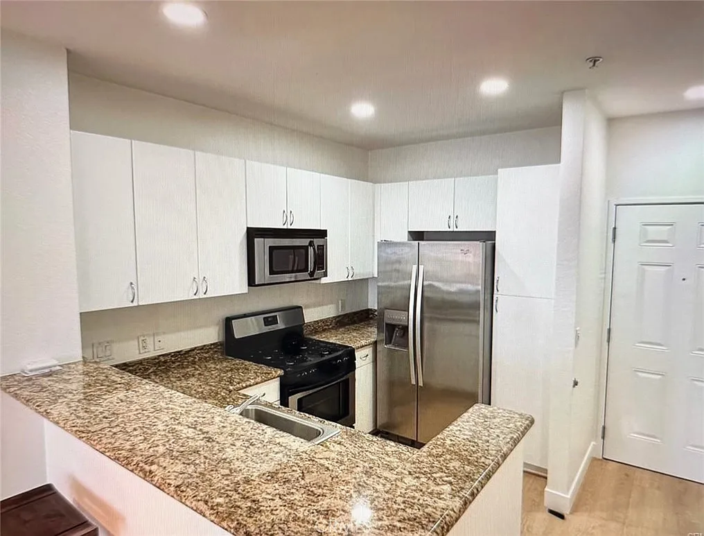 Building Photo - 1801 E Katella Ave #3129