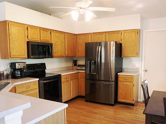 New slate stainless LG appliances in the kitchen. Refrigerator will remain in the house so that all appliances will match.