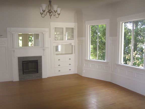 Dining room view with two bay windows