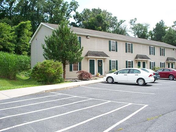 Dumpster location to the left of building
