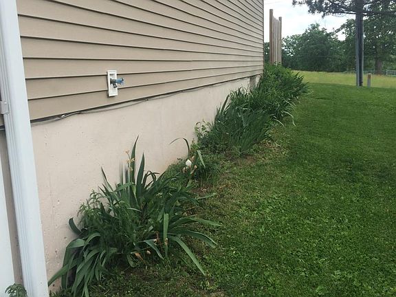Established landscape for curb appeal & homey feel!