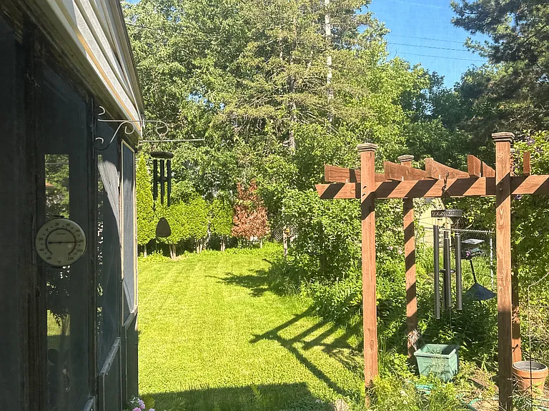 Back yard oasis, and 3 seasons porch.