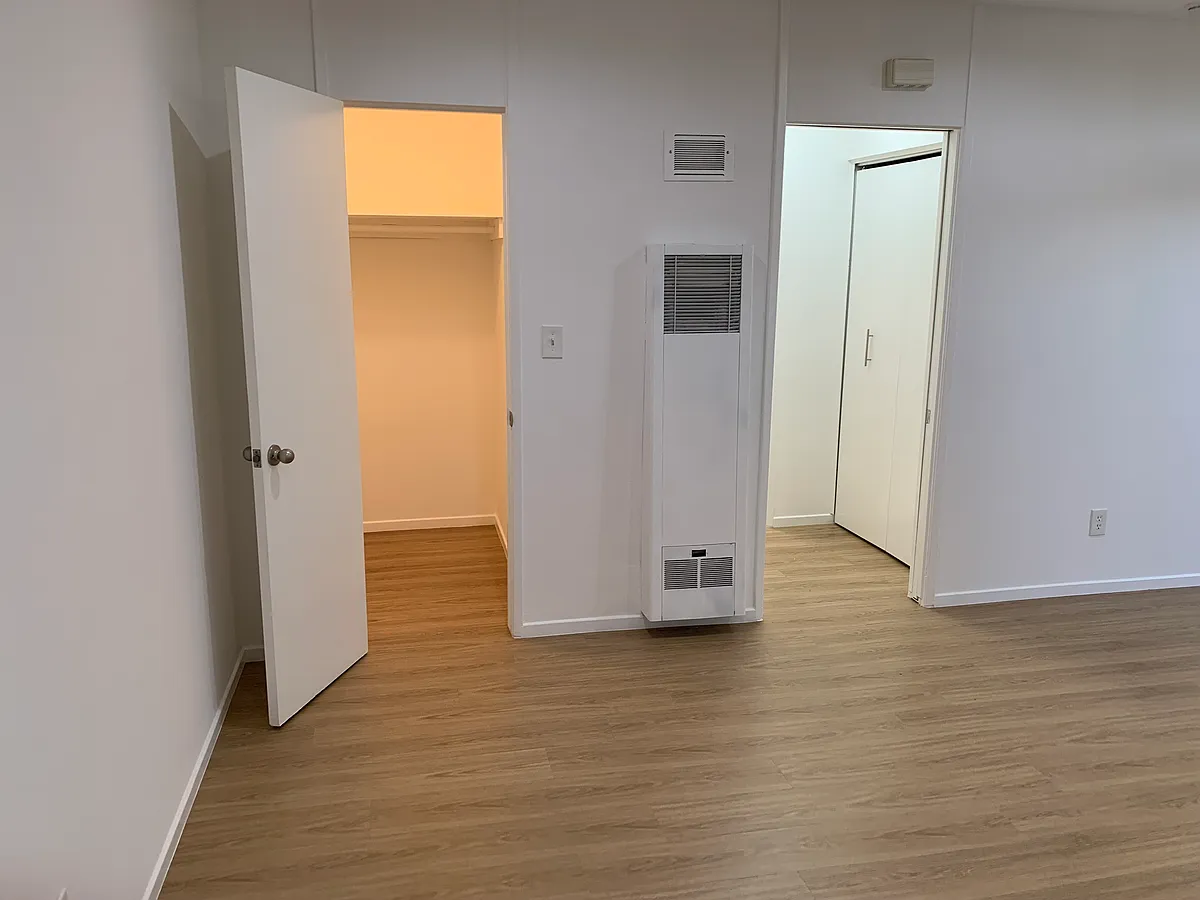 Walk in closet and hallway - 1341 N Crescent Heights Blvd #201