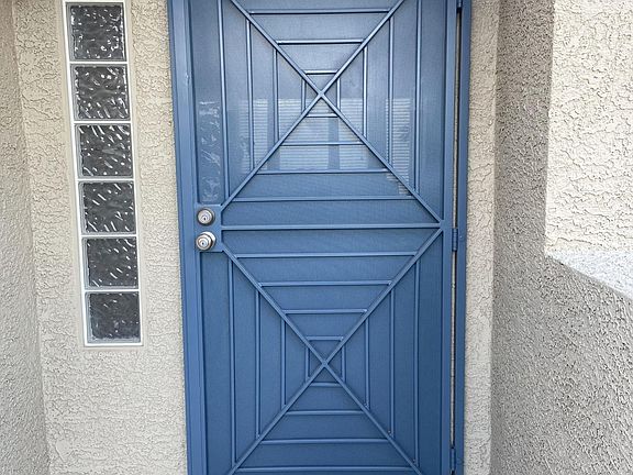 Iron front door entry with 2 locks