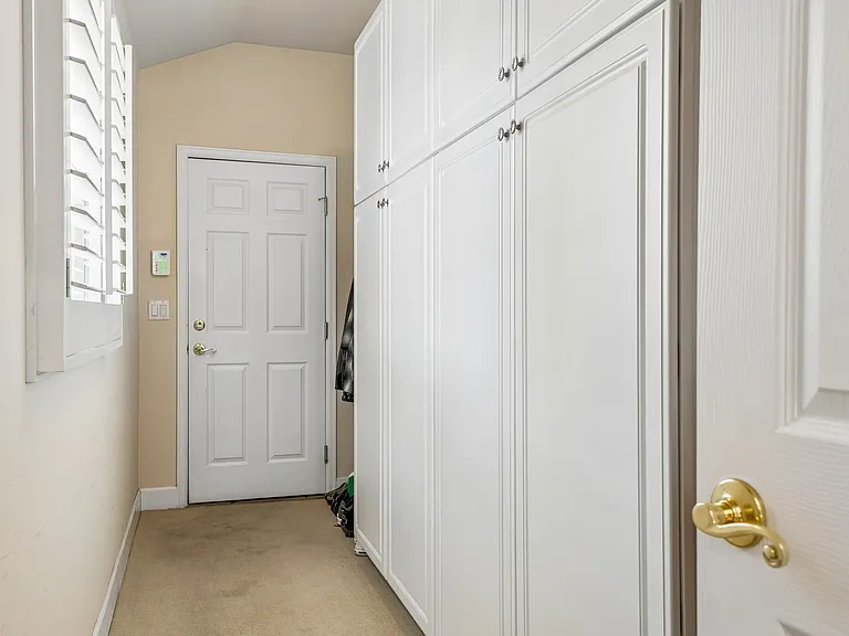 Hallway Pantry leading to Garage