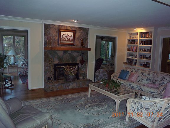 Fireplace opens in Family room & Sun Room