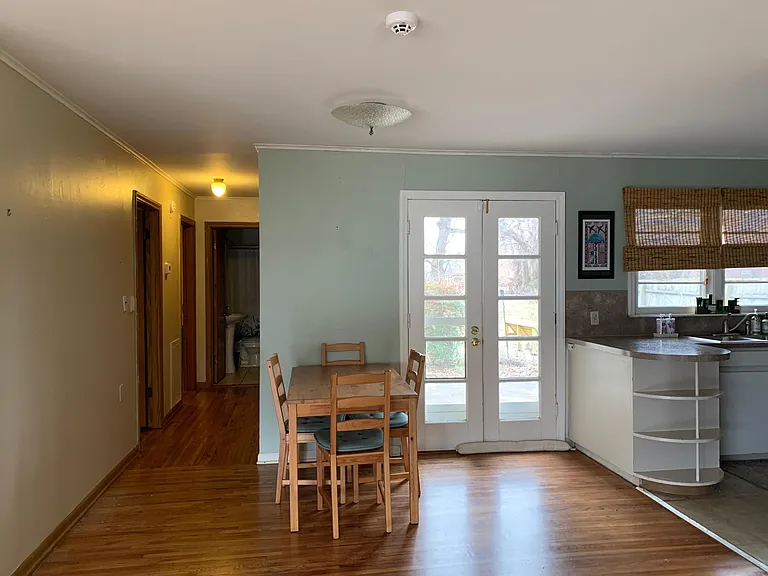 Dining and kitchen area and hallway