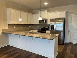 5th image of 208 Riverbank Way