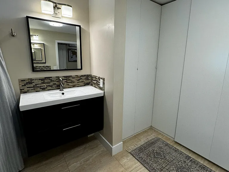 Master with shower and his and hers sinks