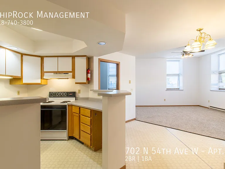 702 N 54th Ave W #6 — Photo 2