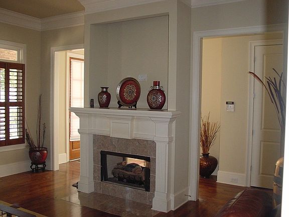 Dbl Sided Fireplace in Formal Living Room and Foyer