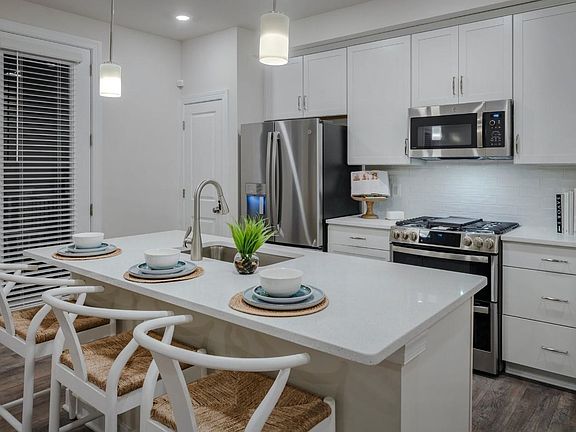 Kitchen area with door to balcony