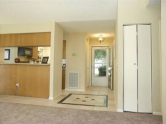 The family room opens to the entry and the kitchen. This is a wonderful gathering space.