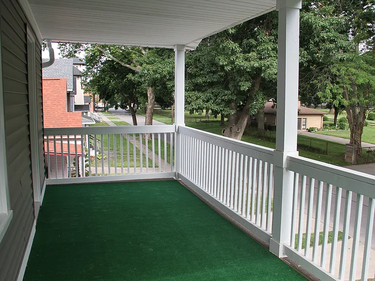 Upper unit features access to private balcony.