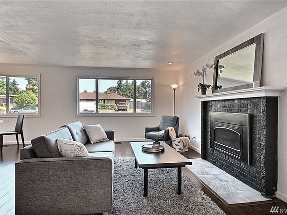 This view of the living area shows the immense amount of natural light that flows through the room