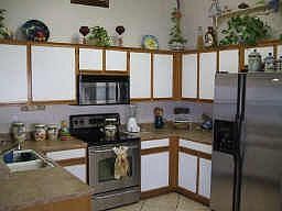 Custom tile counters/stainless appliances remain