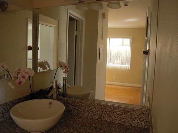 Granite vanity, designer vessel sink