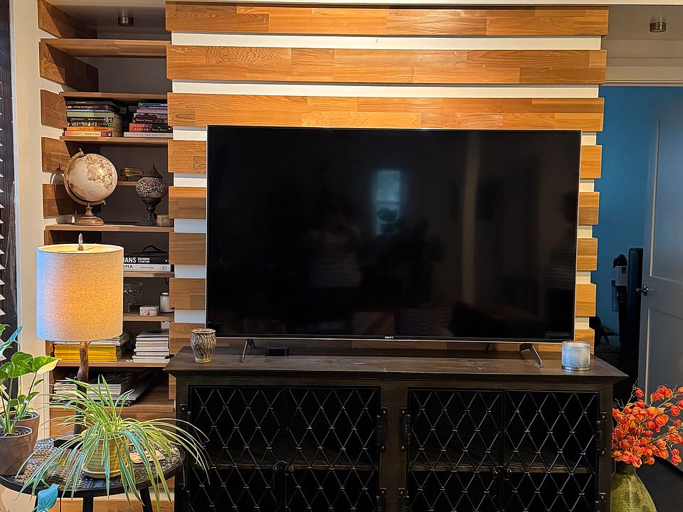 built in shelves on TV wall
