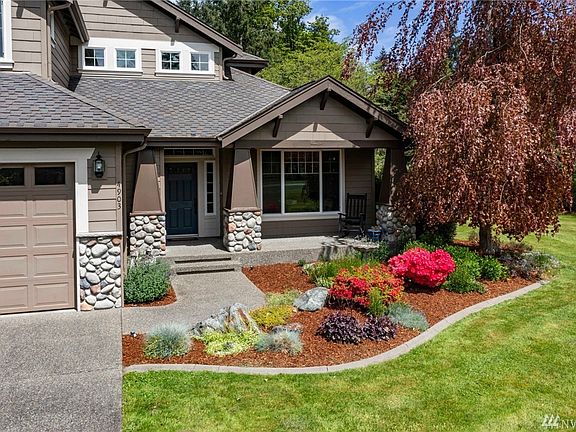 Professionally Landscaped with Concrete Boarders and Sprinkling System