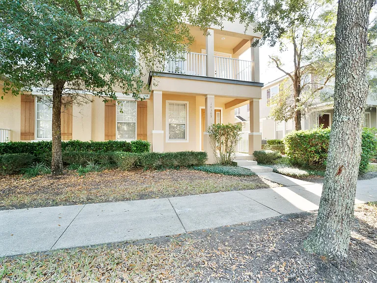 Front entrance and upstairs master private balcony