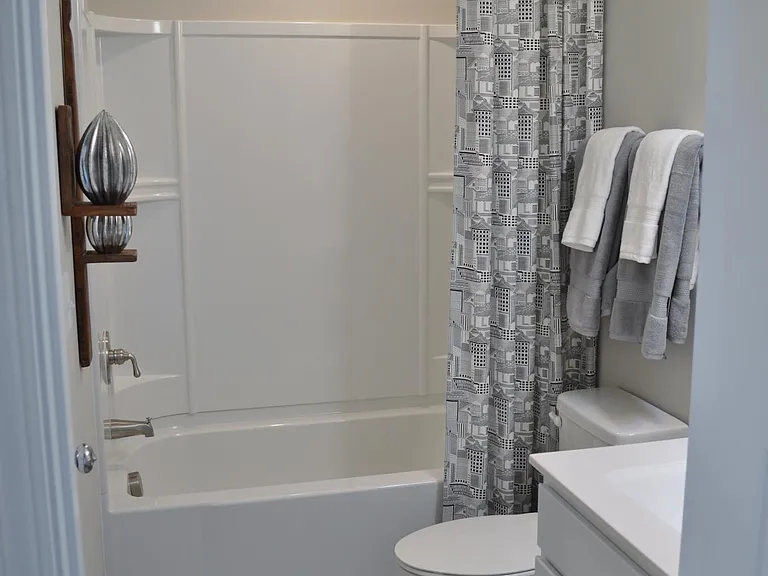 The hall bath has entry from the hall and the second bedroom.