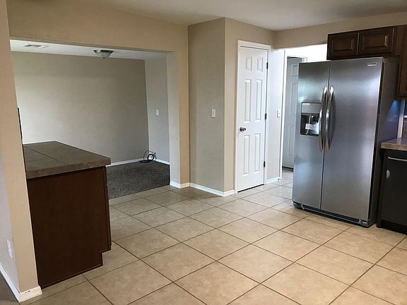 Great bonus room off kitchen for office, TV Room or kids play area.