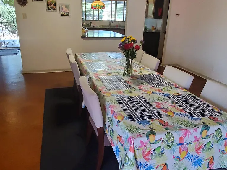 Huge Dining area this is a table for 10 with loads of room! Looking into Kitchen at far end.