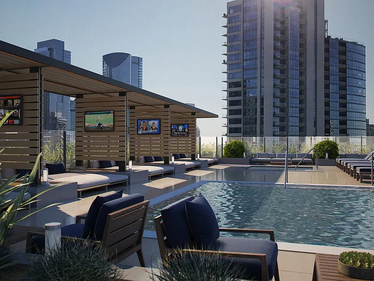 Poolside cabanas with large screen TVs