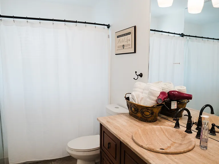 hall bathroom with tub/shower